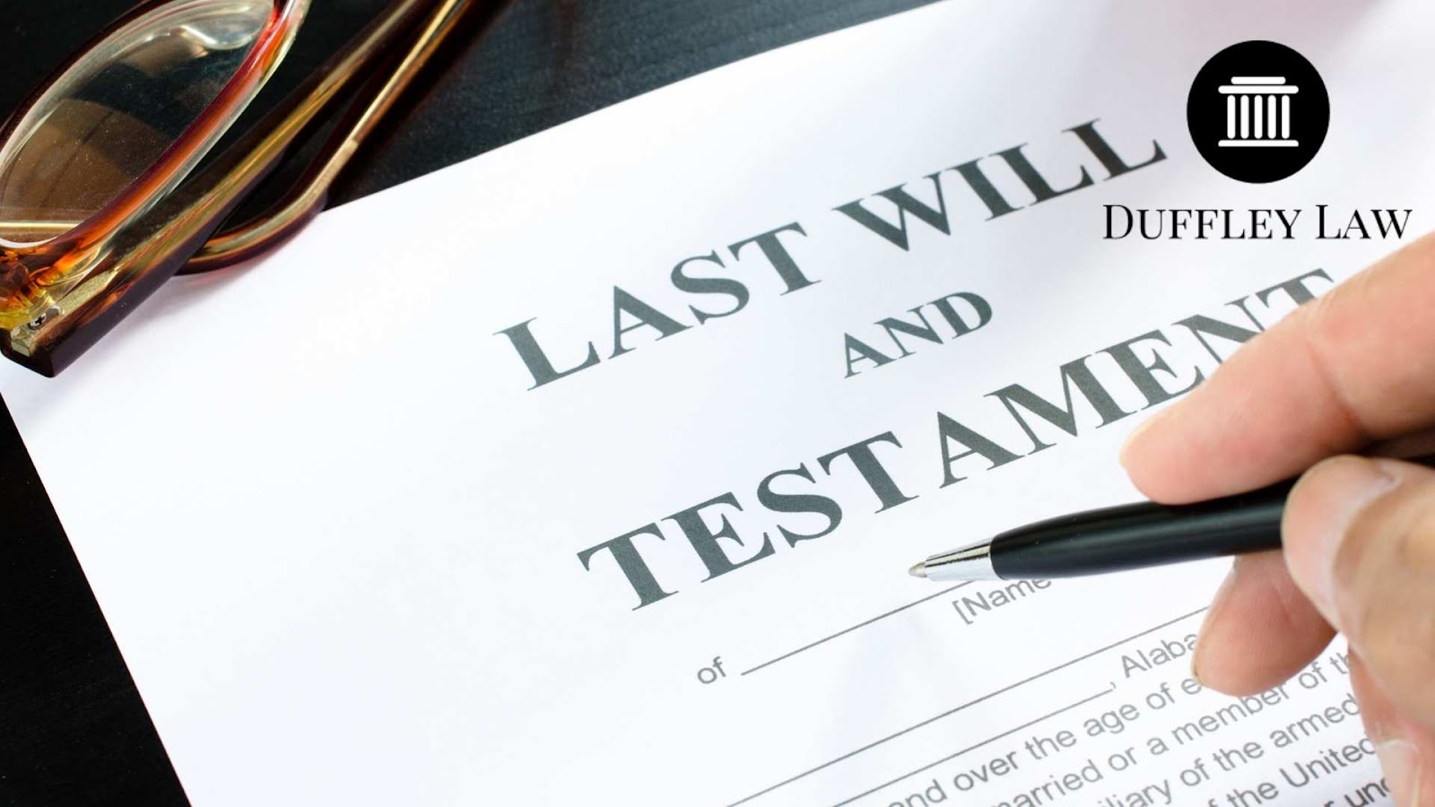 Hand writing over a ''last will and testament'' document