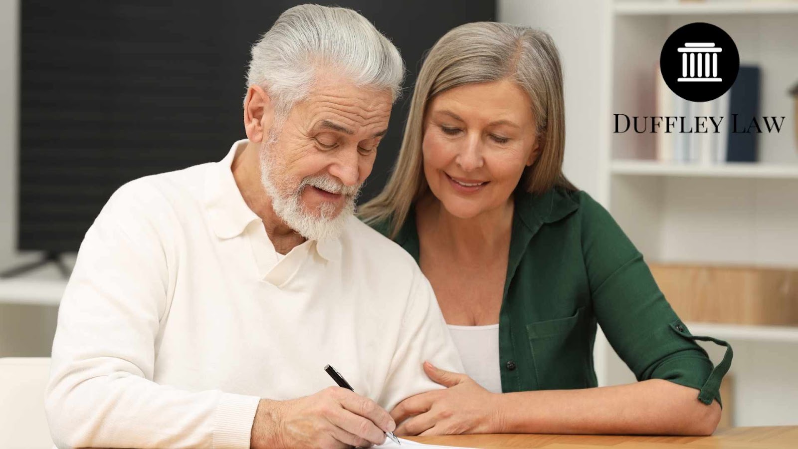 Elderley couple signing probate papers