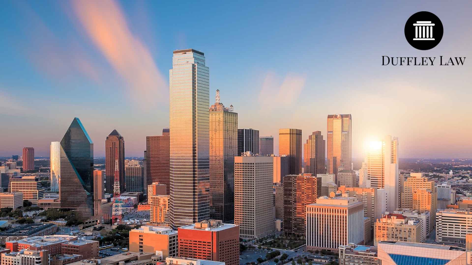 Sunset view of Dallas skyline with skyscrapers.