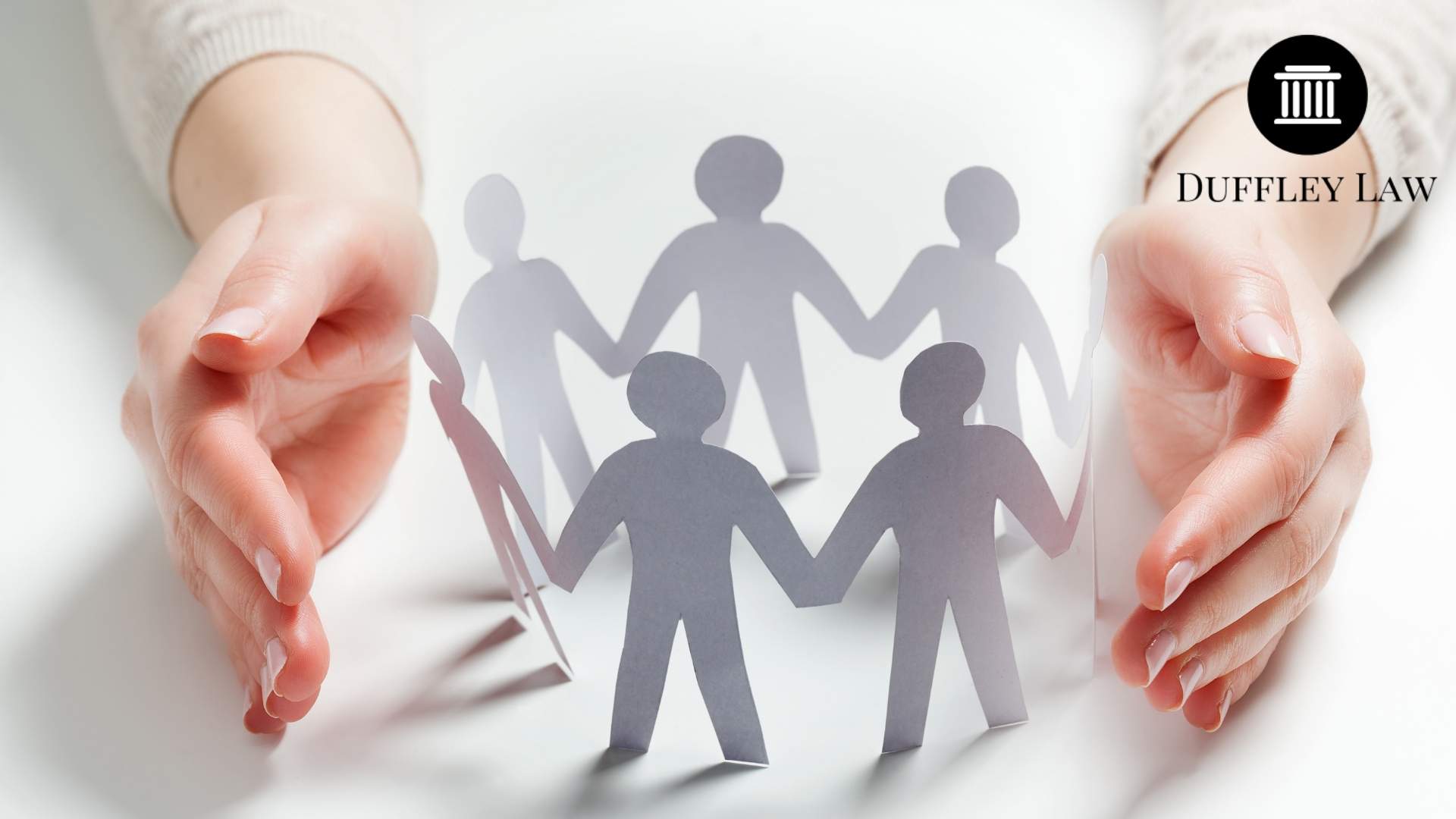 Hands framing paper people chain, Duffley Law logo