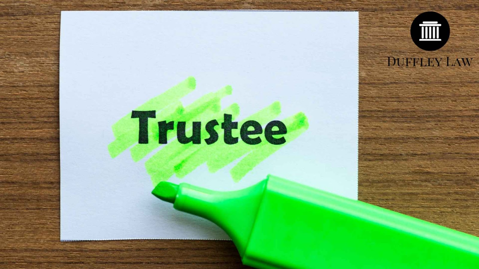 Trustee highlighted with green marker on paper