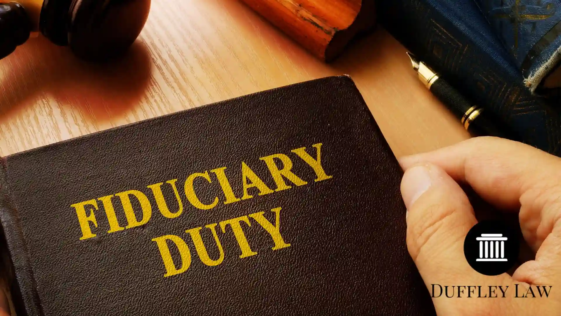 Fiduciary duty law book on desk
