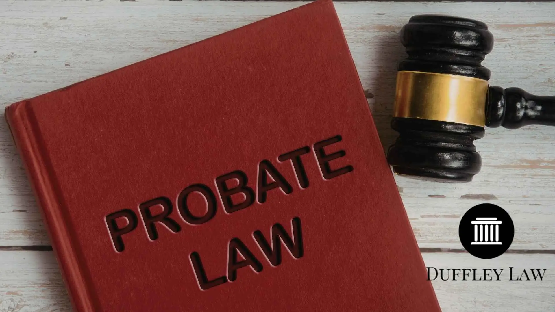 Probate law book and gavel on table