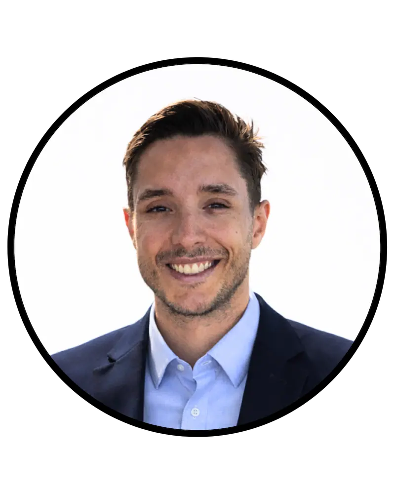 Smiling man in suit against white background
