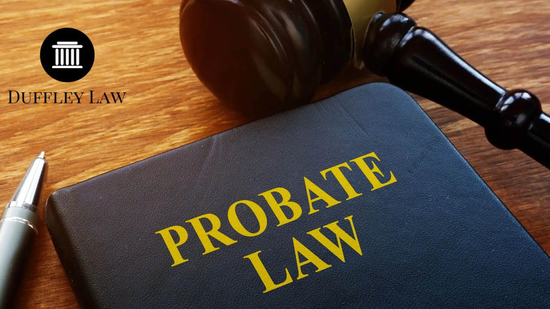 Probate law book with gavel and pen