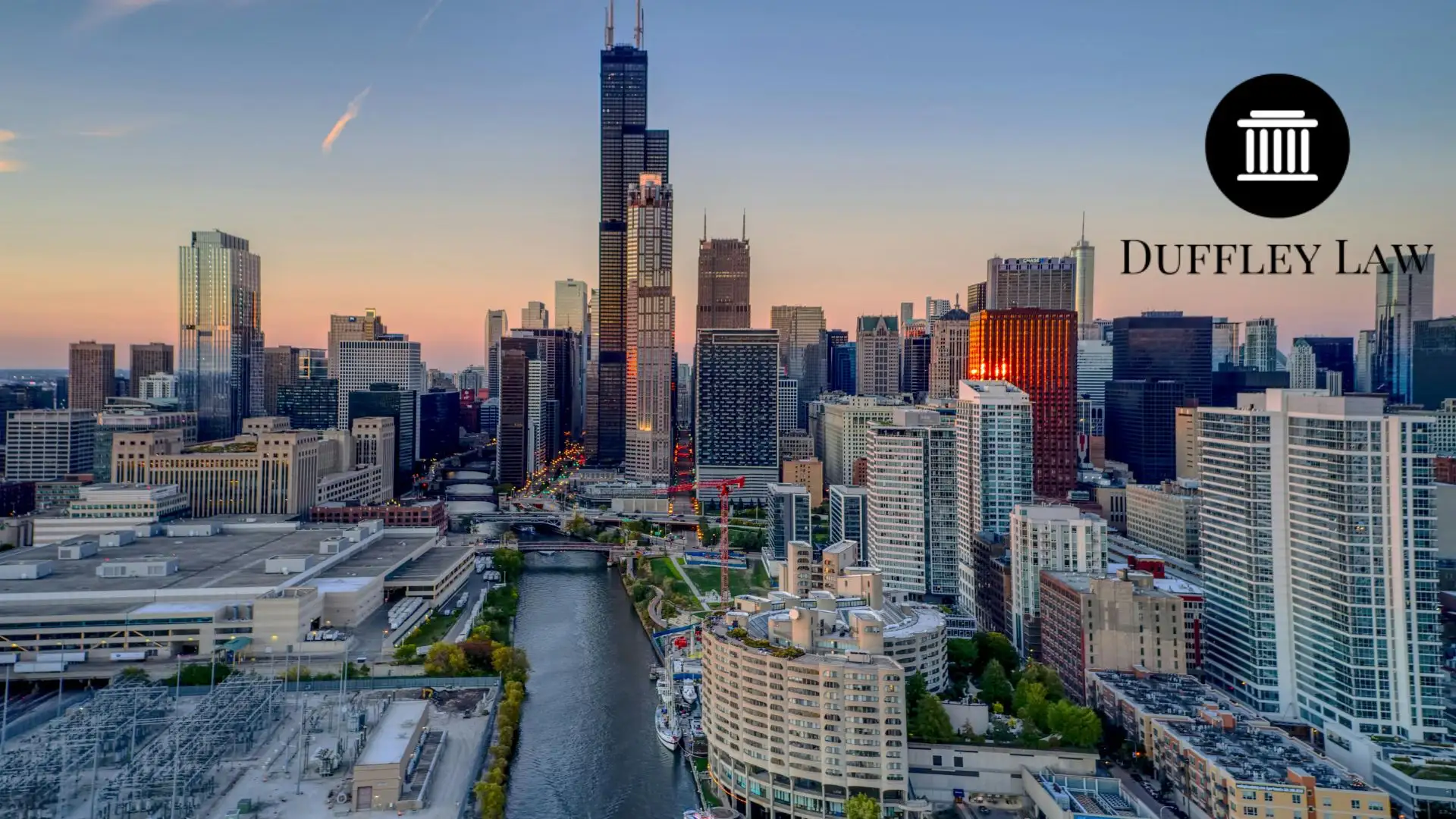 Chicago skyline at sunset with river and skyscrapers
