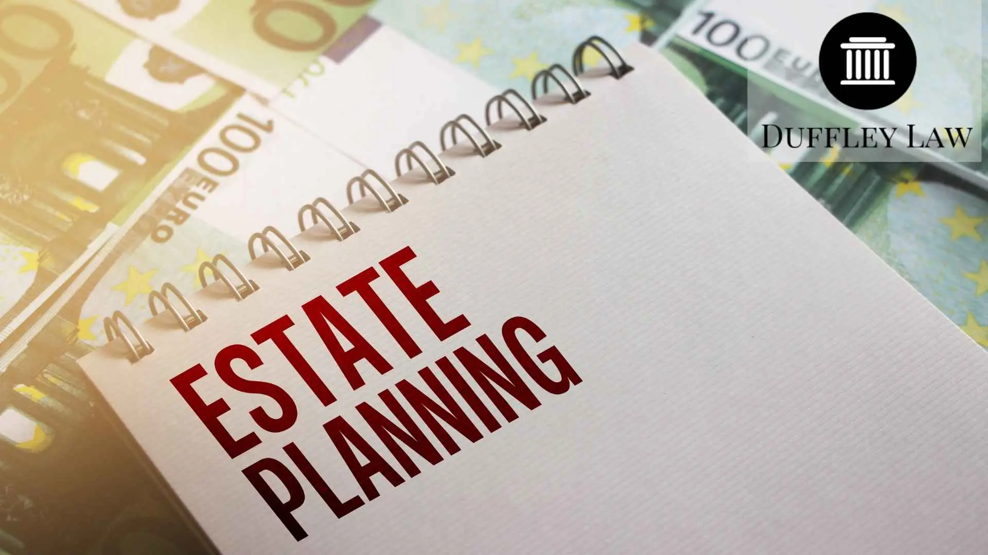 Estate planning notebook resting on banknotes
